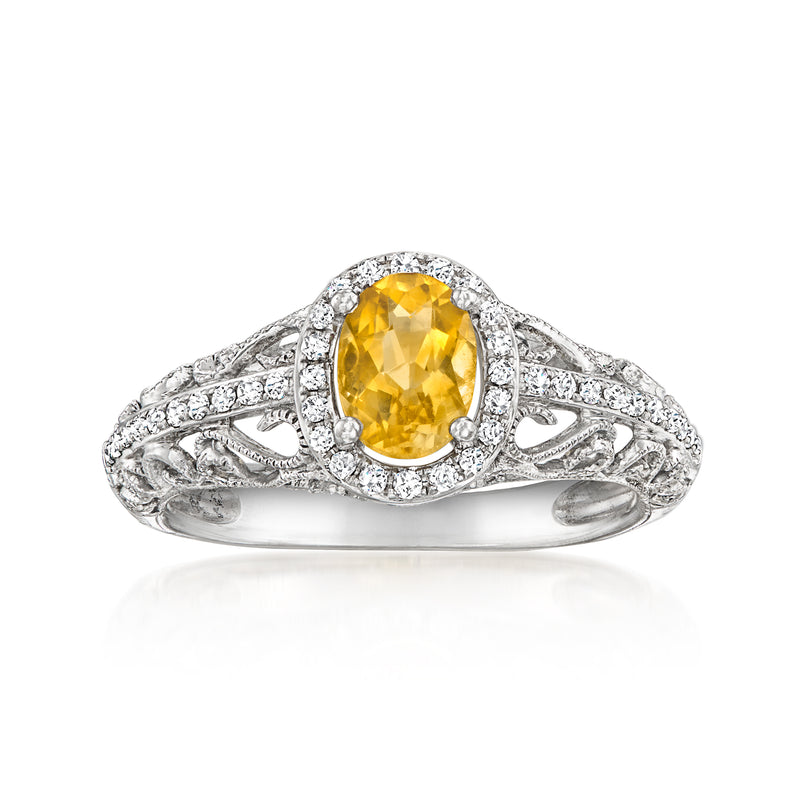 Vintage white gold ring with oval citrine center, diamond halo, ornate filigree