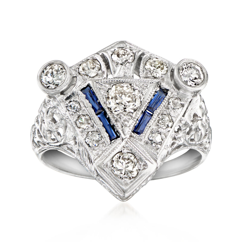 Vintage white gold cocktail ring with diamonds and blue synthetic sapphire centerpiece