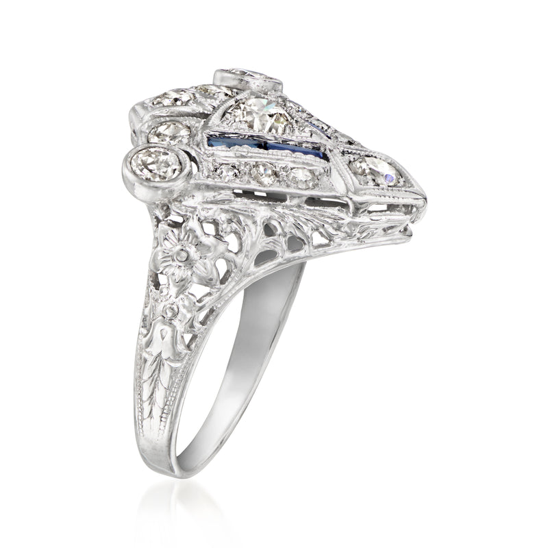 Vintage white gold ring side view with blue sapphire detail and diamond accents