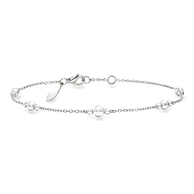 Sterling silver bead station bracelet with small round beads and leaf charm