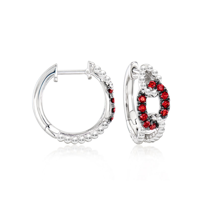 Sterling silver hoop earrings with red gemstone cluster inside the hoop