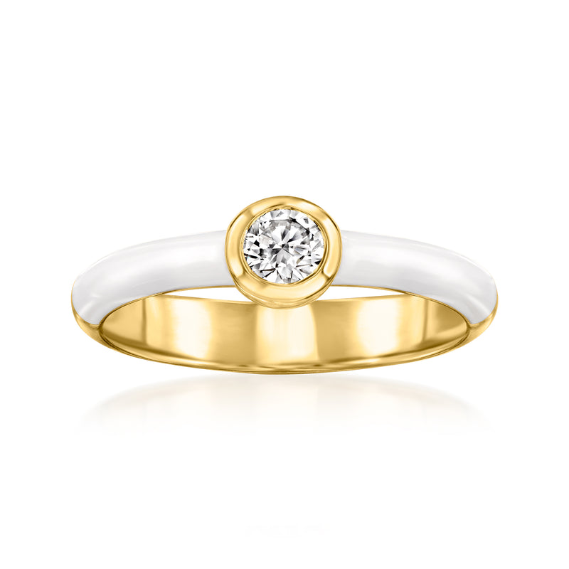 Lab-grown diamond ring with round bezel-set stone, gold band and white enamel accents.