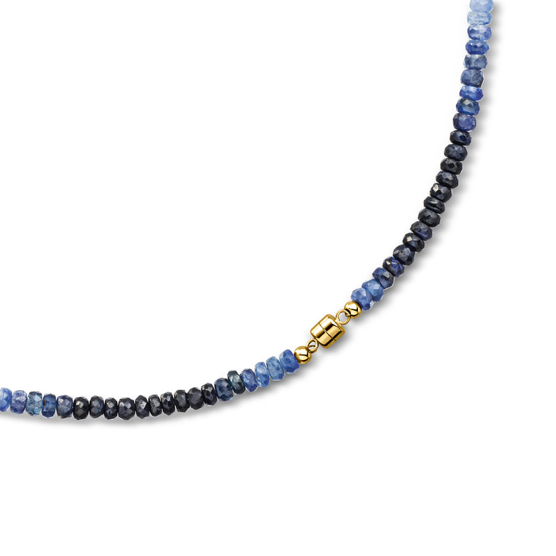 Tonal blue sapphire bead necklace with 14kt yellow gold magnetic clasp close-up