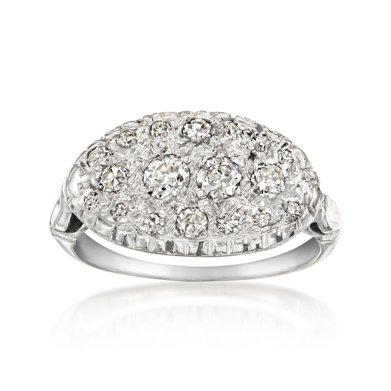 Vintage white gold diamond cluster ring with oval array of prong-set round stones