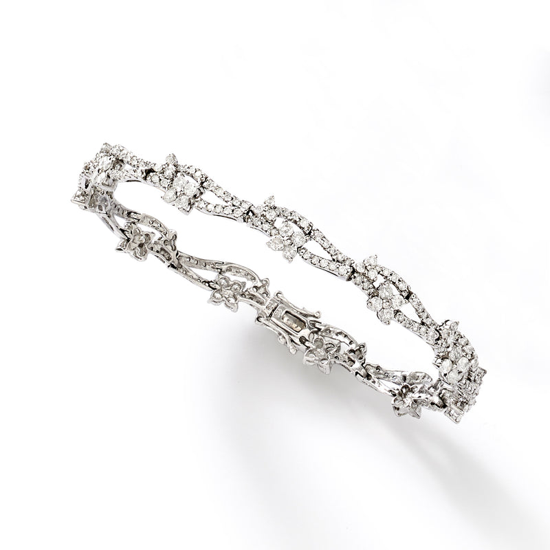 14kt white gold diamond floral bracelet with openwork link details and rectangular clasp