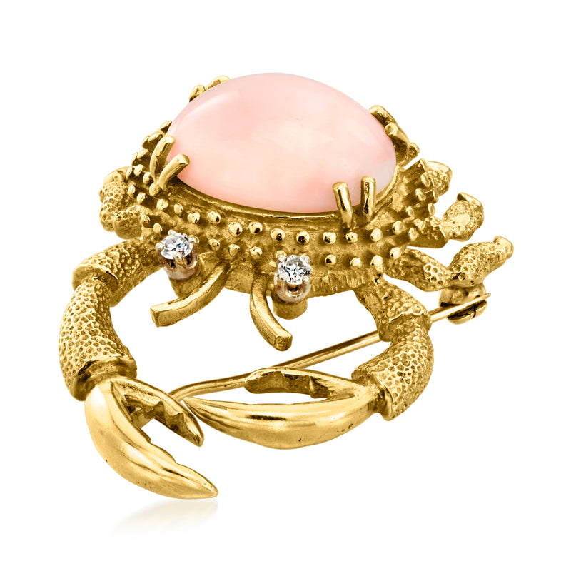 Gold crab brooch pin with round pink cabochon center and glittering stone details