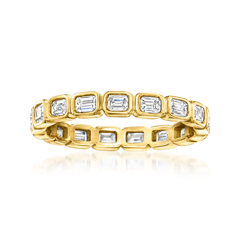 Gold eternity ring with emerald-cut lab-grown diamonds in open square settings