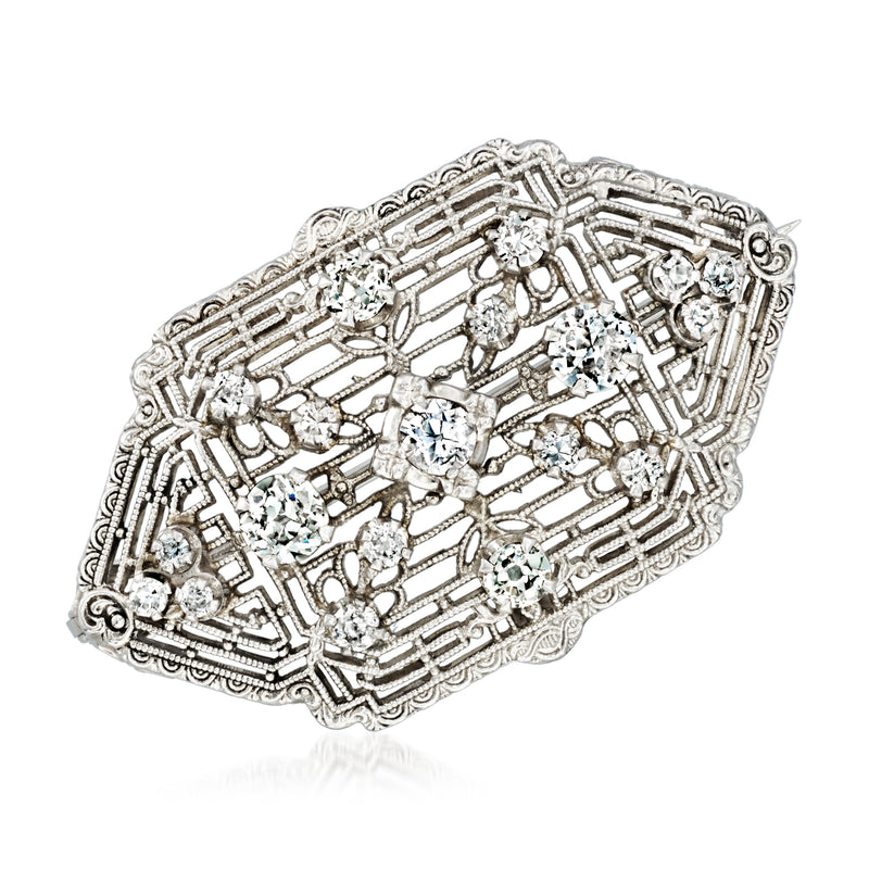Vintage diamond filigree pin in white gold, octagonal geometric setting with round stones.
