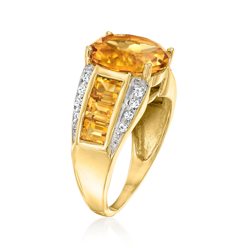 Yellow gold ring with large octagonal citrine and diamond-trimmed baguette settings.