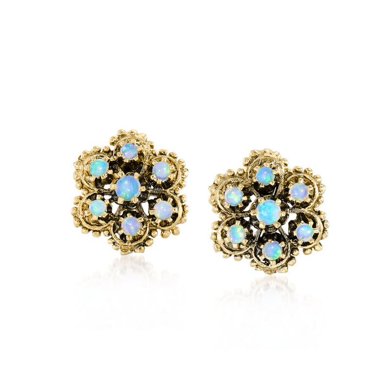 14kt yellow gold flower clip earrings with blue opal-like stones