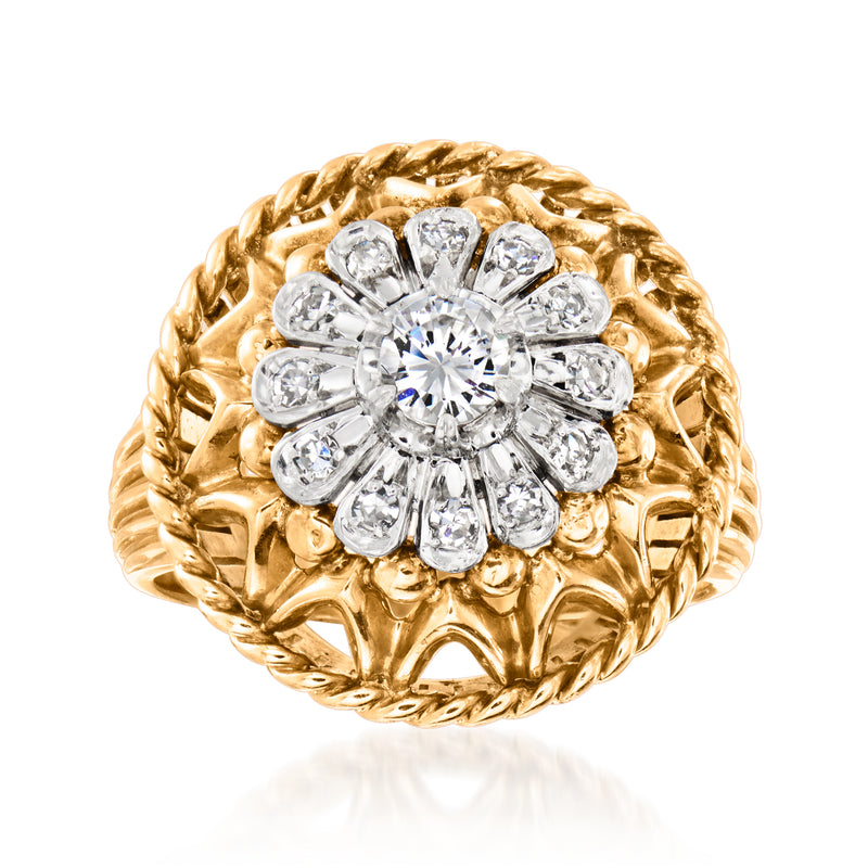 Vintage gold diamond cluster ring with round center stone and halo of small diamonds