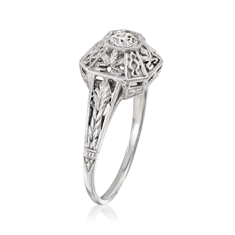 Vintage openwork diamond ring in 14kt white gold, filigree top with round center stone