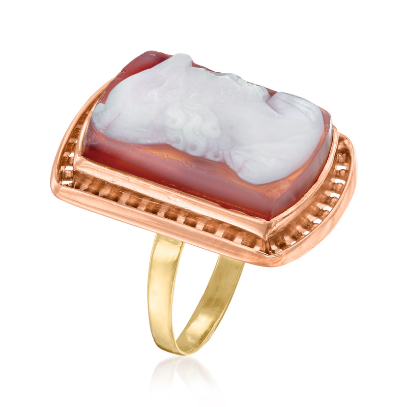Agate cameo ring angled view: white relief set in red rectangle bezel, gold band