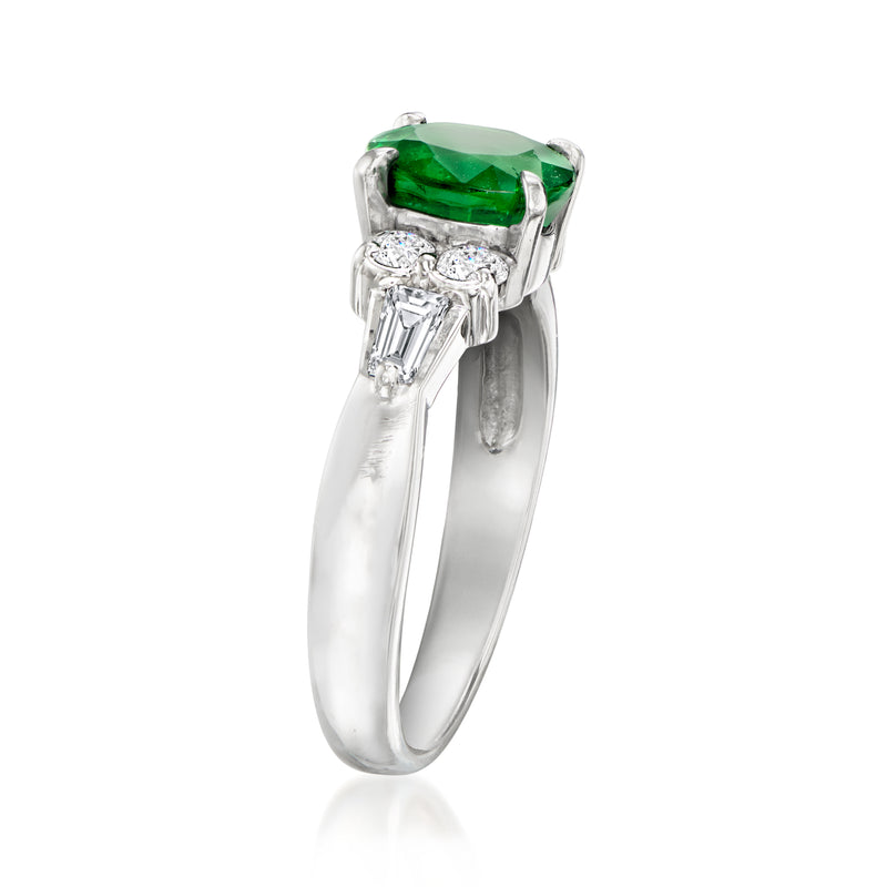 Platinum ring featuring a square green tsavorite with baguette diamonds