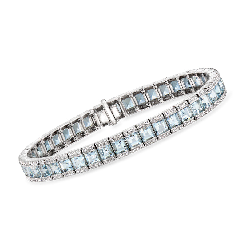 Aquamarine and diamond tennis bracelet in 14kt white gold, hinged row of blue stones