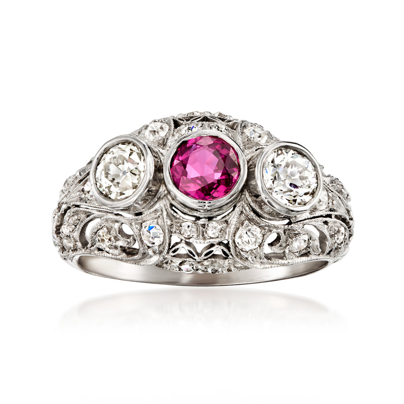 Platinum filigree dome ring with pink ruby center and white diamond accents