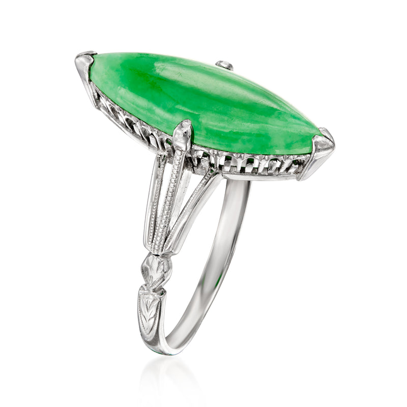 Platinum navette jade ring with elongated green center stone and side prong details