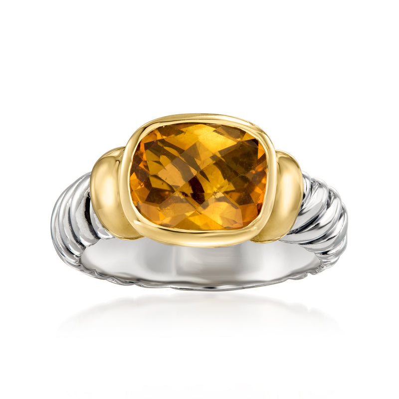 Vintage citrine ring with orange-gold gemstone in yellow-gold bezel, sterling silver band