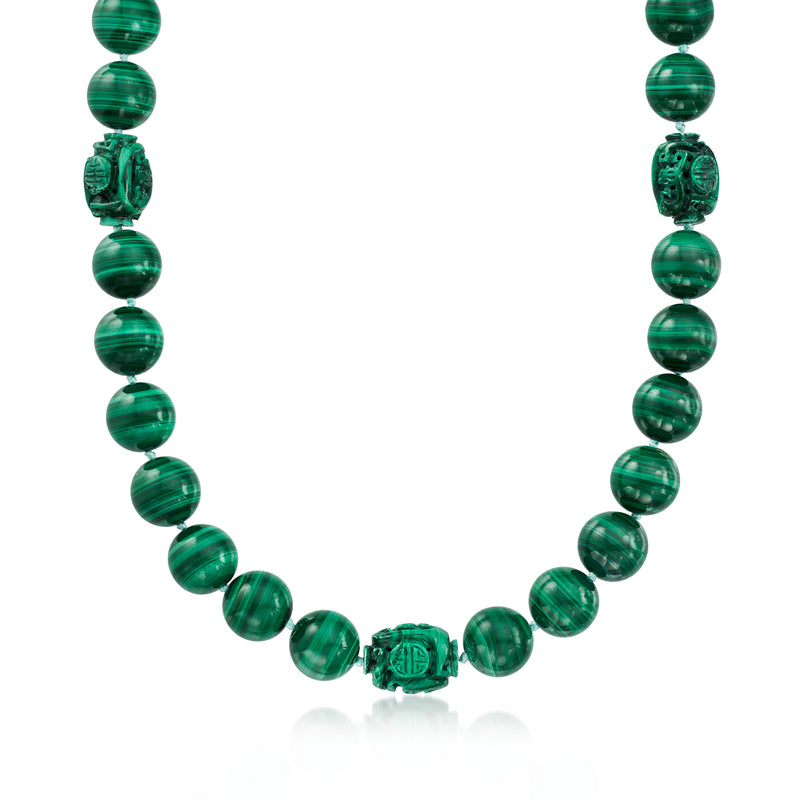 Vintage malachite bead necklace with round green beads and carved centerpiece