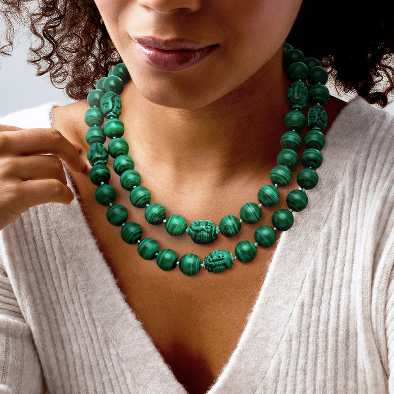 Malachite bead necklace with carved round beads and central medallion