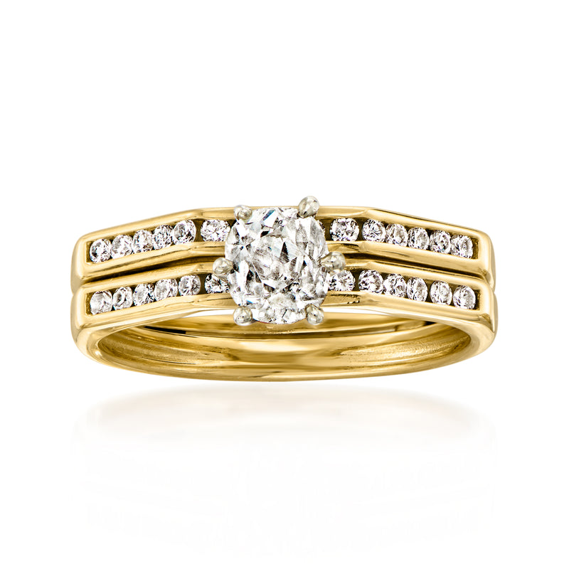 Vintage 14kt yellow gold diamond ring with center stone and pavé shoulders