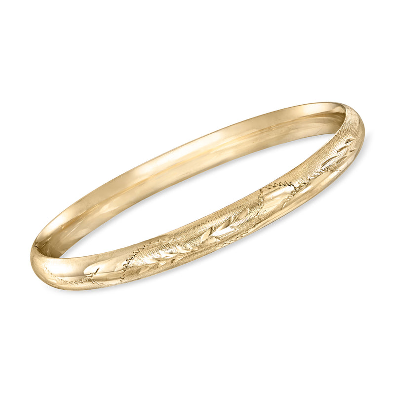 Yellow gold etched bangle bracelet with slim hinged profile