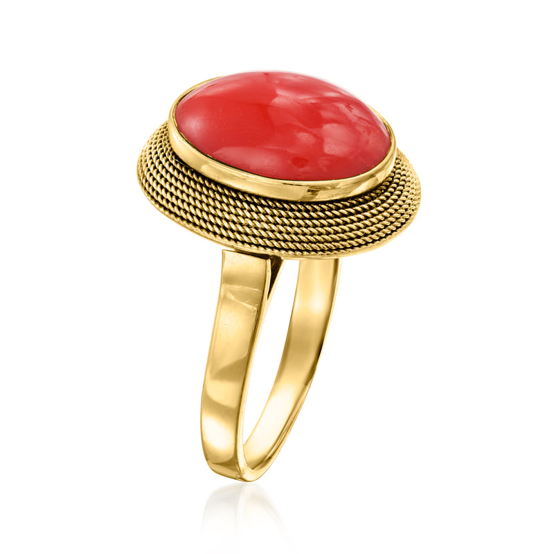 Roped oval coral cabochon ring in 18k yellow gold, open band