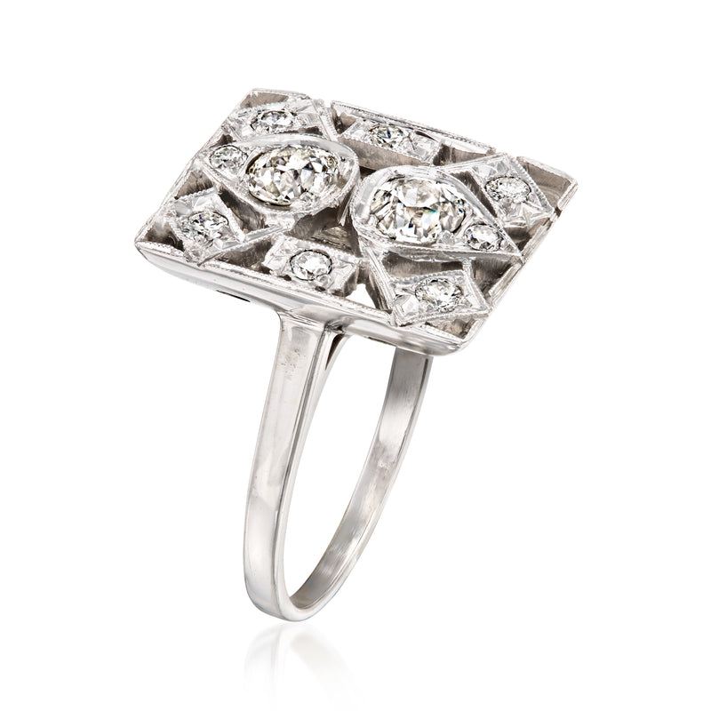 Side view of 14kt white gold rectangle open-space diamond ring with prong-set stones
