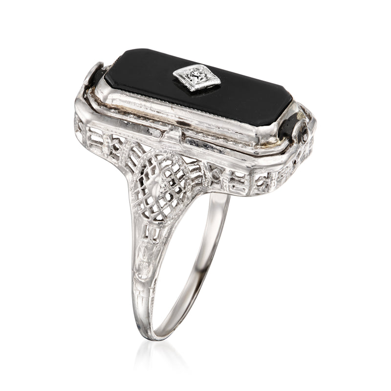 Vintage onyx flip ring with black face, openwork white gold band and diamond-set top