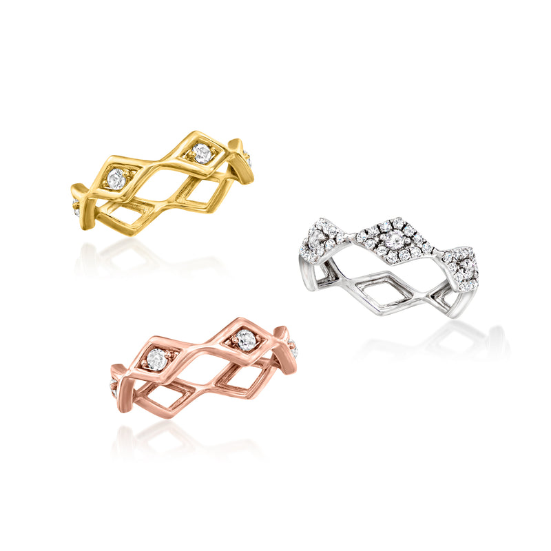 Three zigzag rings—gold, silver, rose—each with white gemstone details