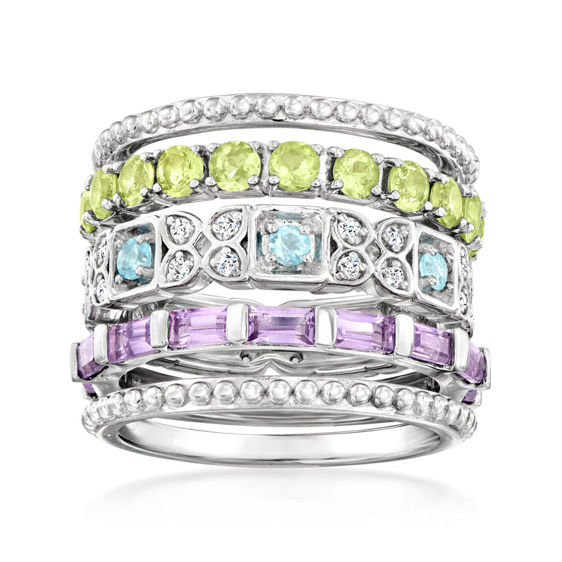 Five-band sterling silver ring set with peridot green, amethyst purple, and aqua blue stones