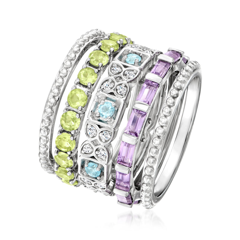 Sterling silver ring with green, aqua blue, and purple gemstone bands
