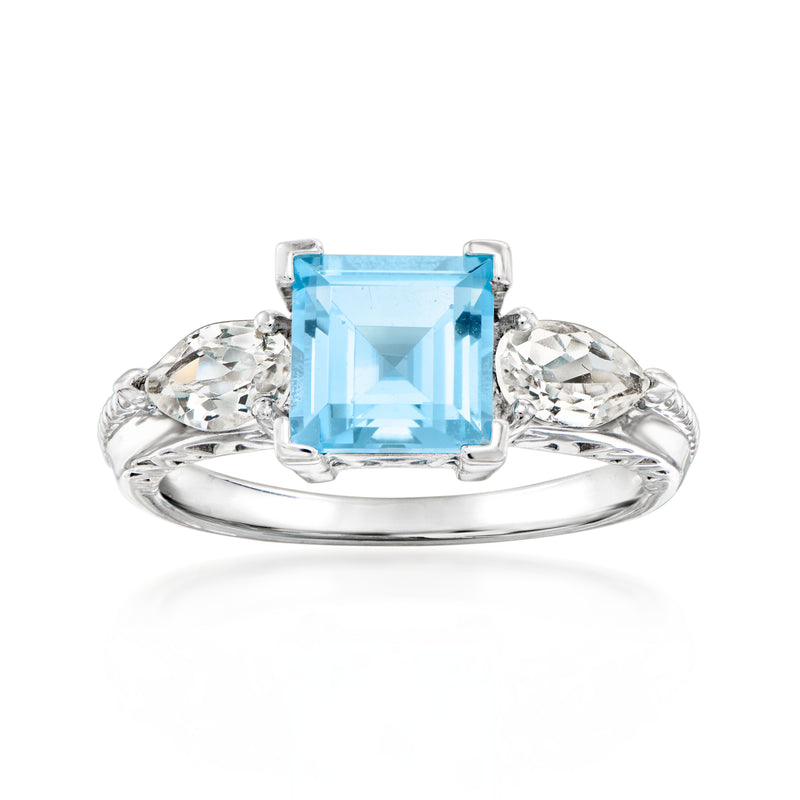 Sterling silver ring with square sky-blue topaz center and clear topaz side stones