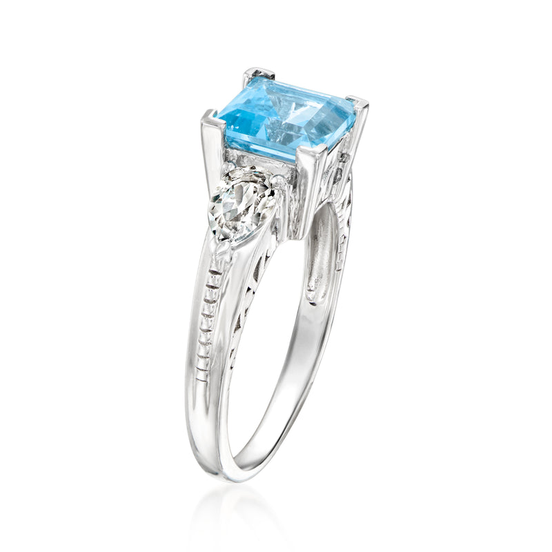 Sterling silver ring with square sky-blue topaz center stone in four-prong setting