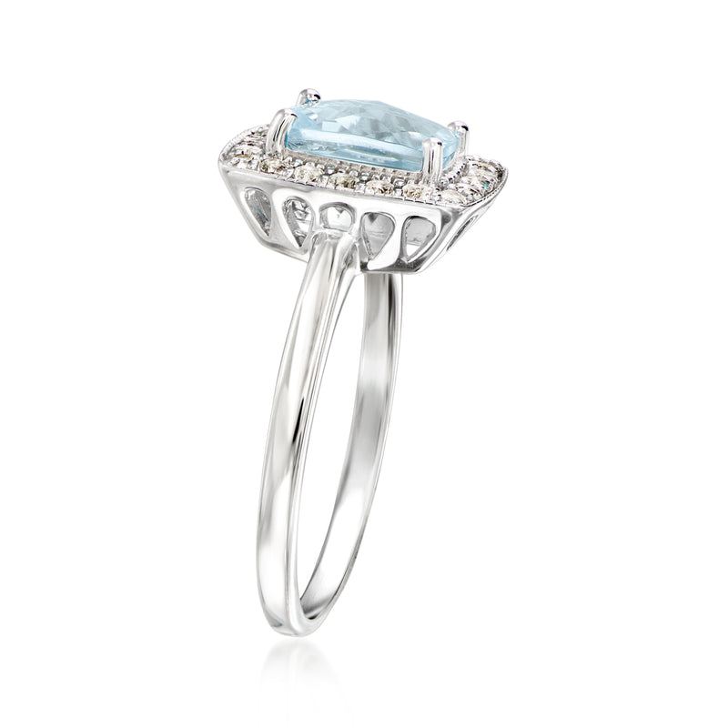 Sterling silver ring with square-cut sky blue topaz and bright white stone halo