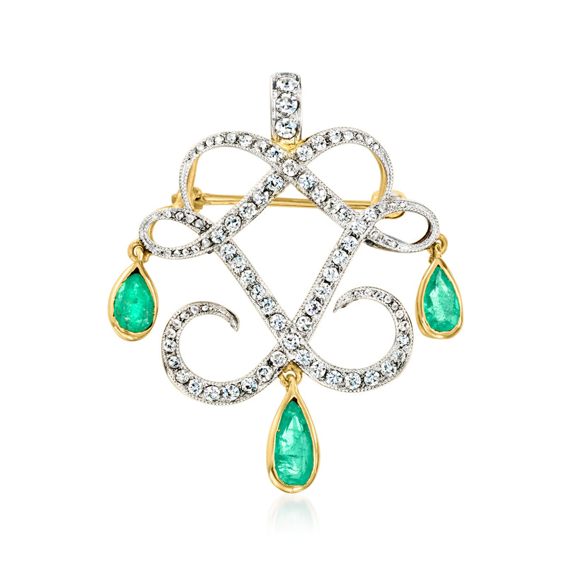 Diamond and emerald scroll pendant with gold loops and green oval drop stones