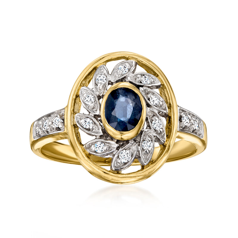 Vintage oval sapphire blue ring with diamond halo in 14kt yellow gold