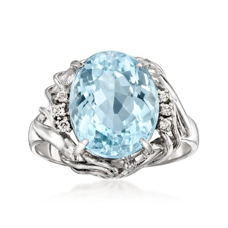Aquamarine and diamond oval ring in platinum, large light blue stone with side clusters
