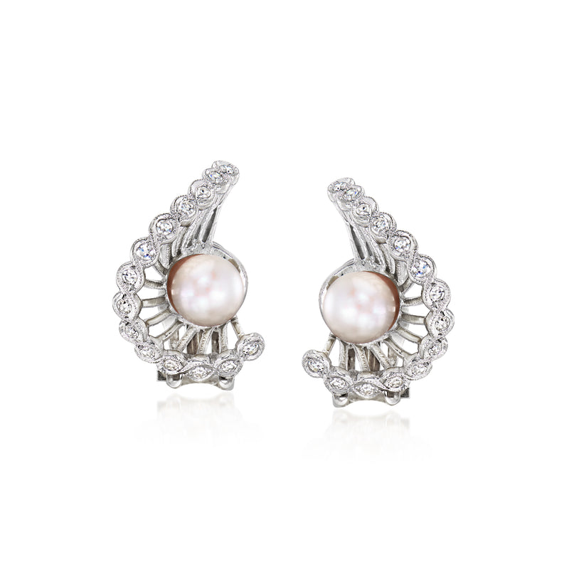Cultured pearl and diamond swirl clip earrings in white gold, oval pearl with halo