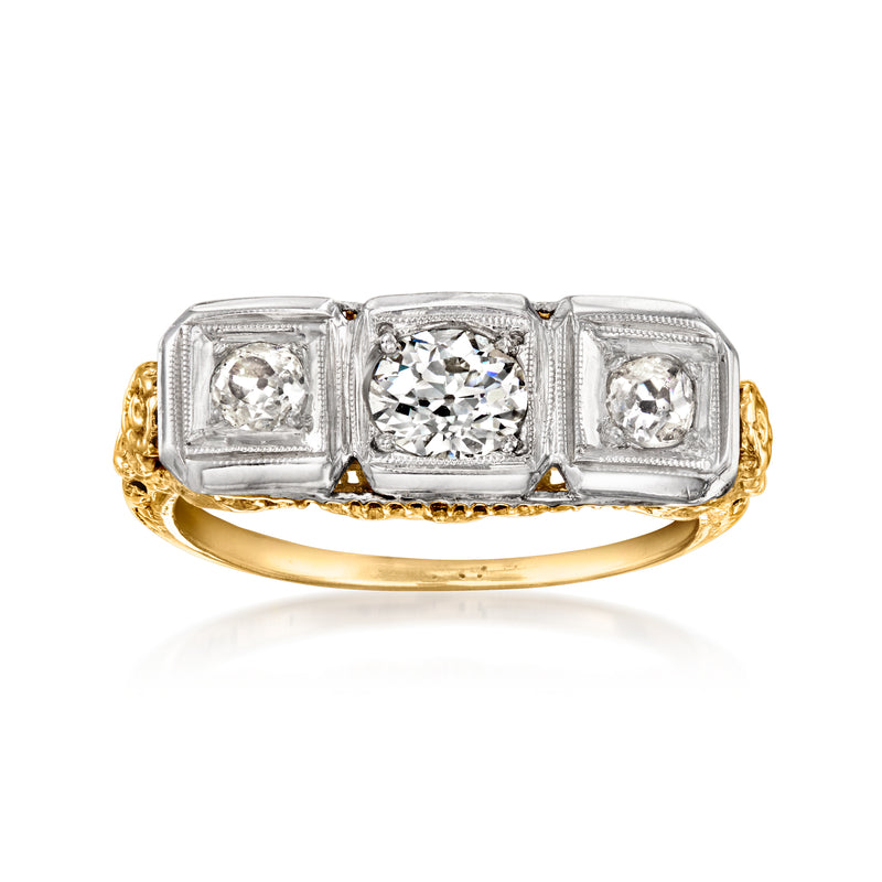 14kt two-tone gold three-stone diamond ring, round center with square side stones