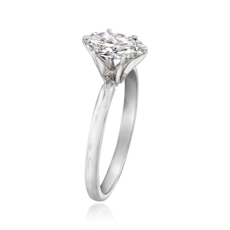 White gold diamond solitaire ring, oval center stone with low-set prongs