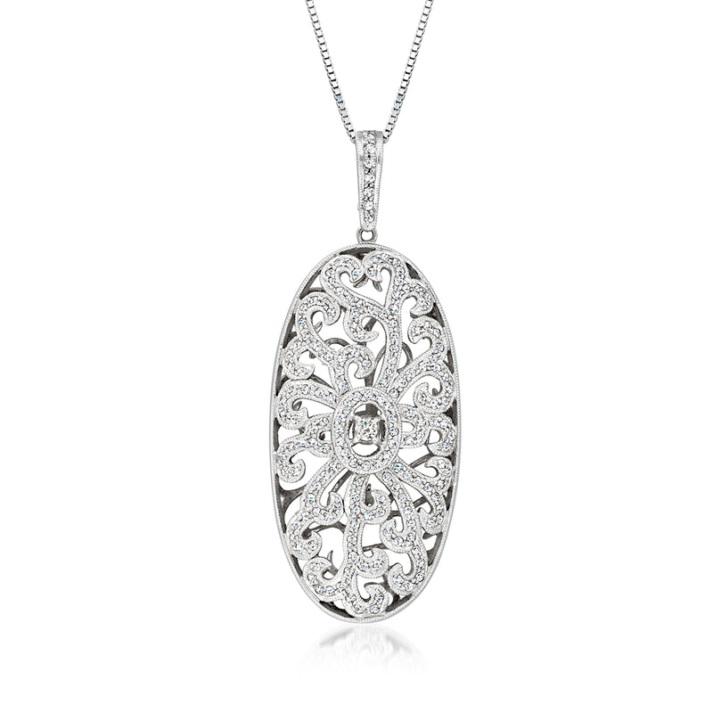 Oval diamond openwork pendant in 14kt white gold with ornate filigree heart design