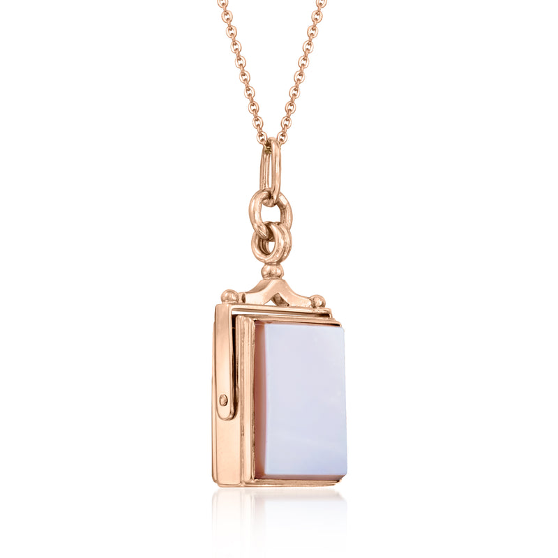 Rose gold swivel pendant necklace with rectangular blue stone and side hinge