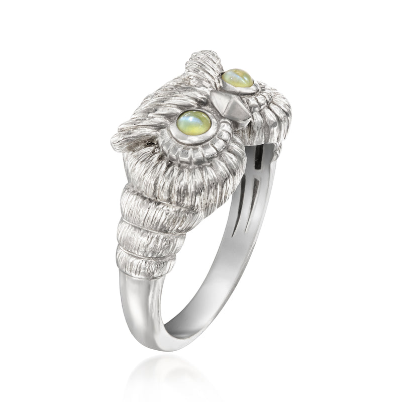 Platinum owl ring with three green cat’s-eye stones, side profile