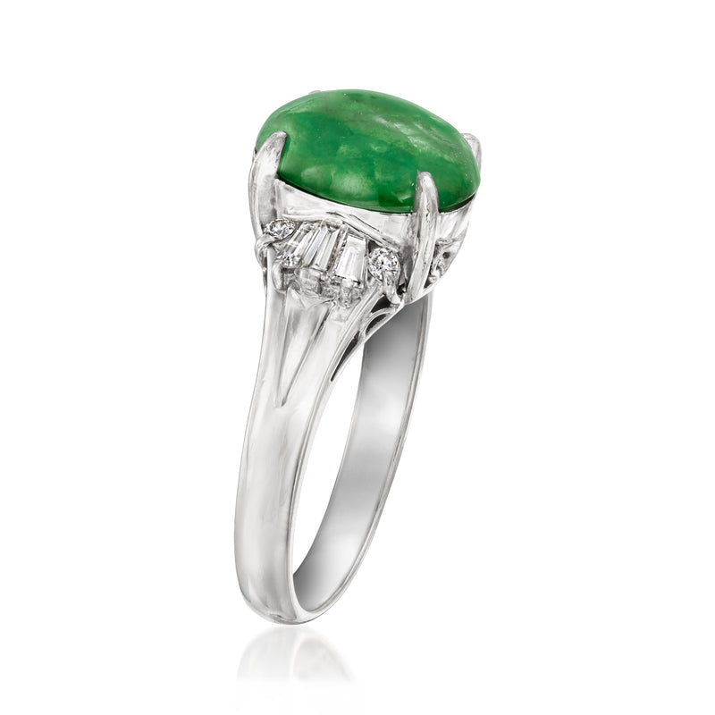Platinum jade and diamond ring with oval green gemstone top and baguette-style accents