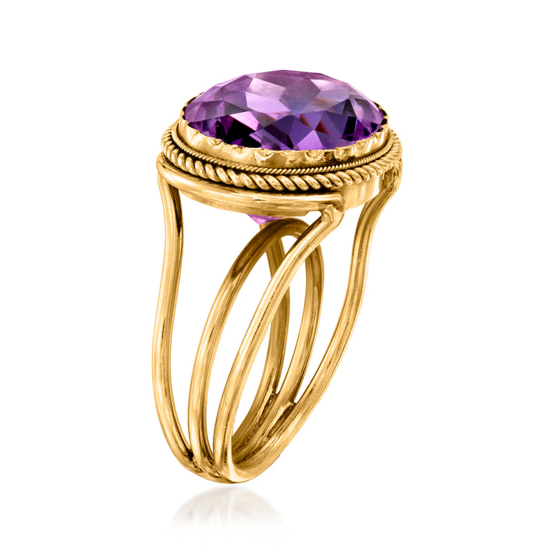 18kt yellow gold amethyst cocktail ring with oval purple stone and rope-textured band.