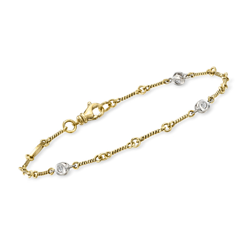 Two-tone 14kt gold bracelet with diamond station links and round bezel accents