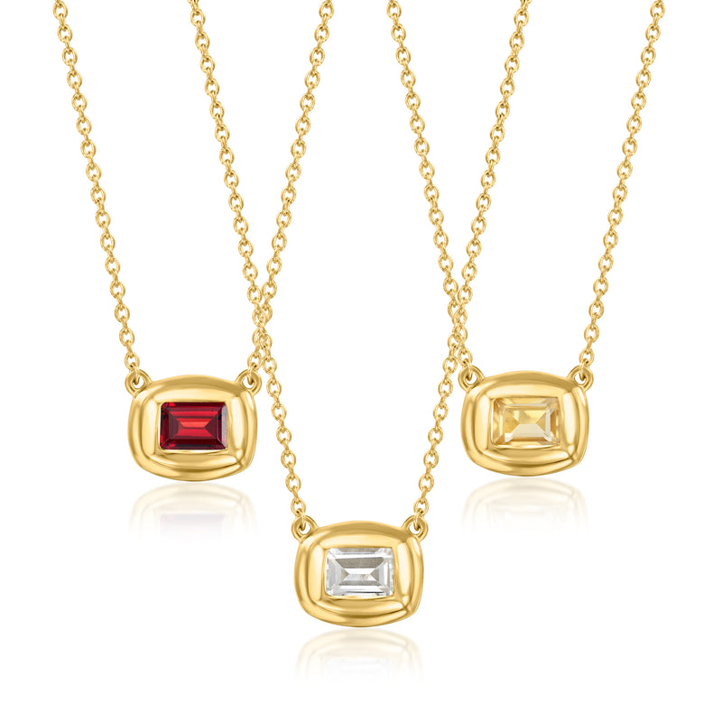 Gold over sterling birthstone necklace with three framed square gemstones on gold chain