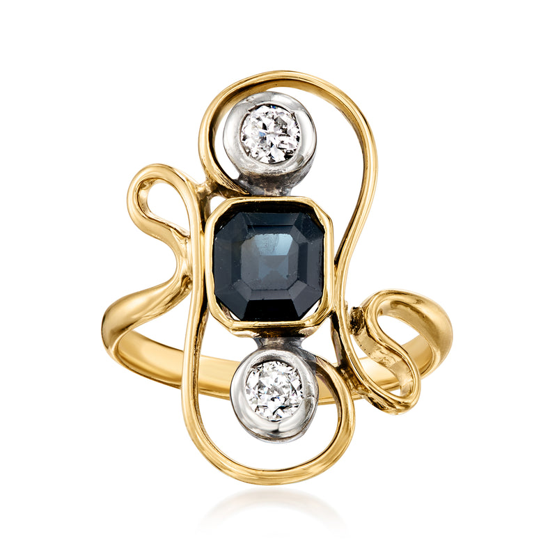 Vintage yellow gold ring with dark blue sapphire center and two round diamond accents
