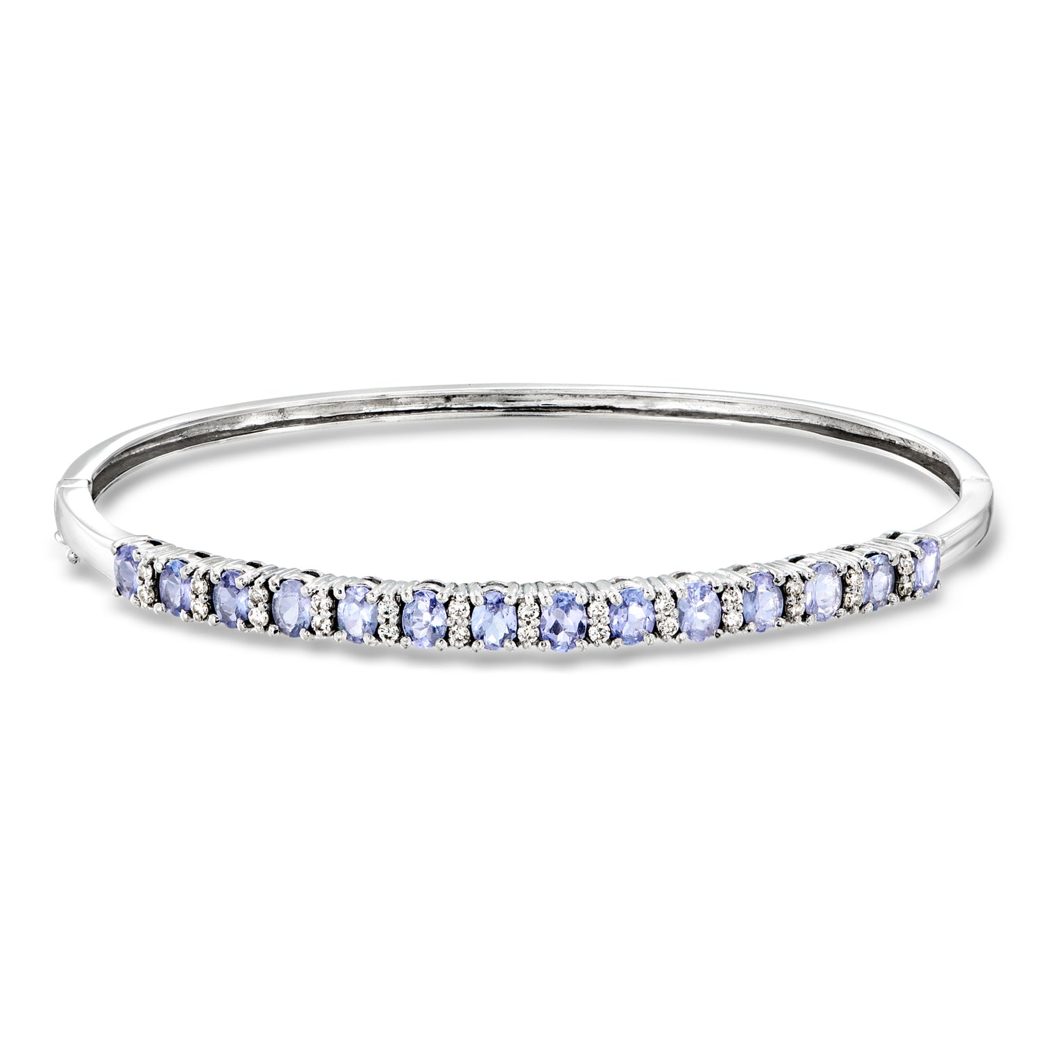 C. 1990 Vintage 2.25 ct. t.w. Tanzanite Bangle Bracelet with .45 ct. t.w. Diamonds in 14kt White Gold
